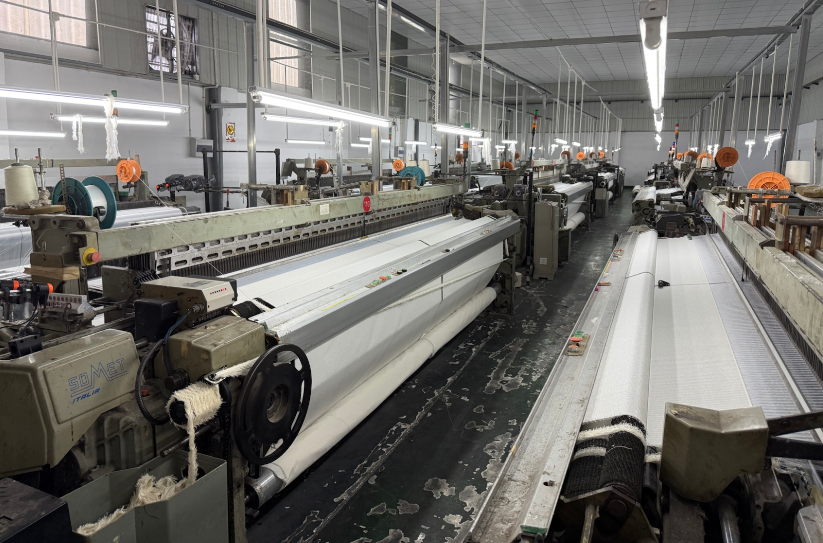 逆势中的智慧抉择：诸暨枫桥剑杆织厂携手羽帆，以无屏采集器破局增效